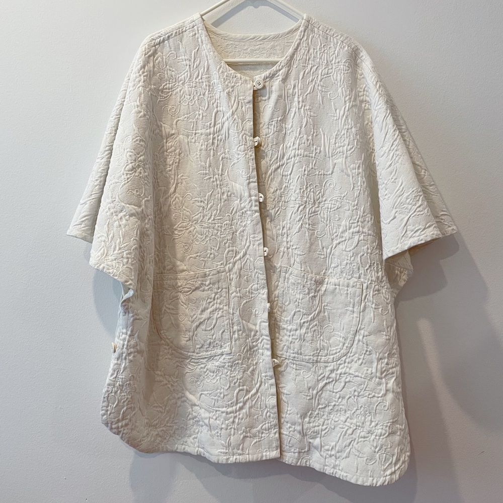 Quilted short sleeve coat